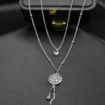 Caret Pendant